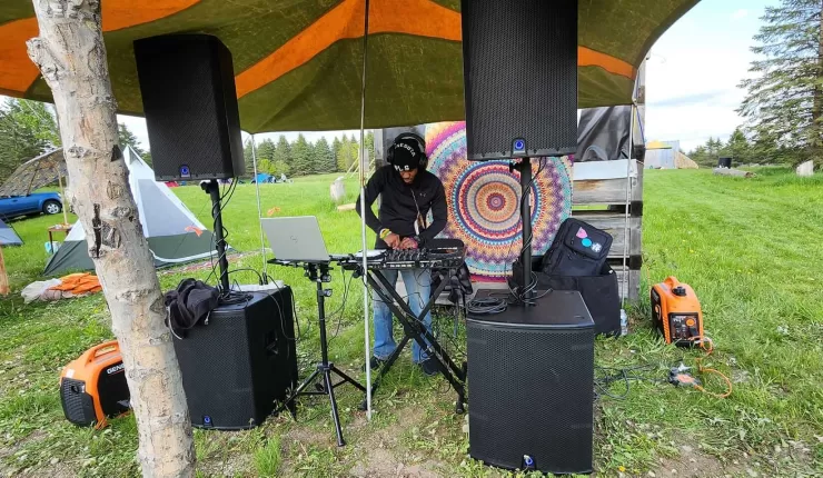 DJ set up outdoors under a tent