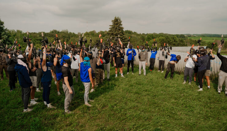 Large group of boys holding their markers up