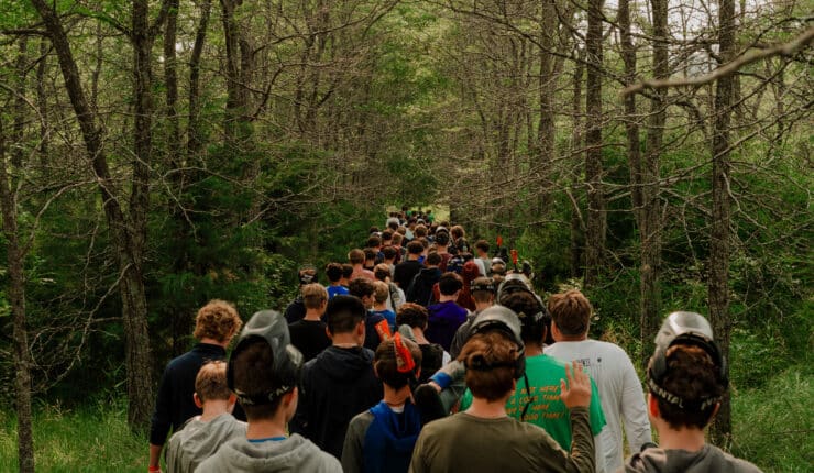 Group of boys walking down a trail 2