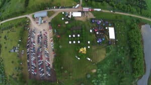 Overhead shot of staging with cars in the lot